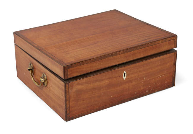
	
		A George III satinwood toilet box, the inlaid top opening to reveal a fitted interior of...