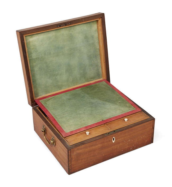 
	
		A George III satinwood toilet box, the inlaid top opening to reveal a fitted interior of...