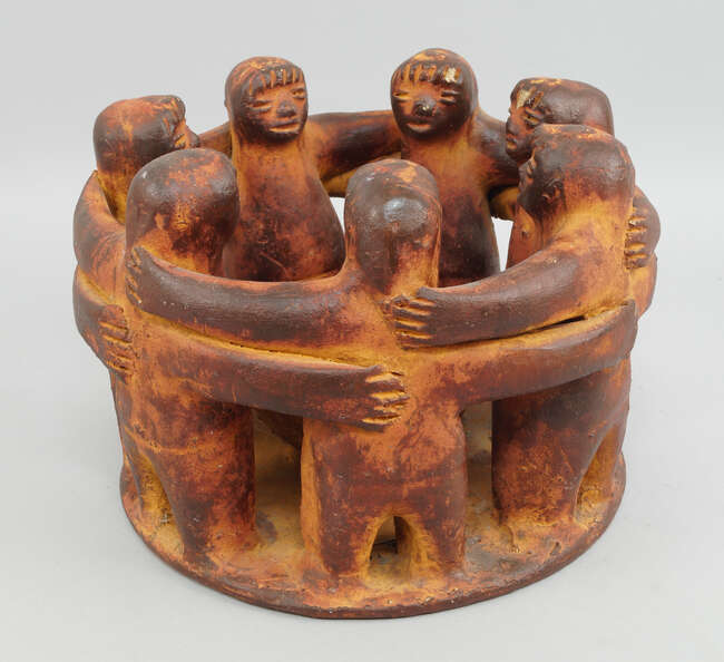 
	
		A Pre-Columbian style pottery friendship ring, probably 20th century, 23.5cm diameter
		
