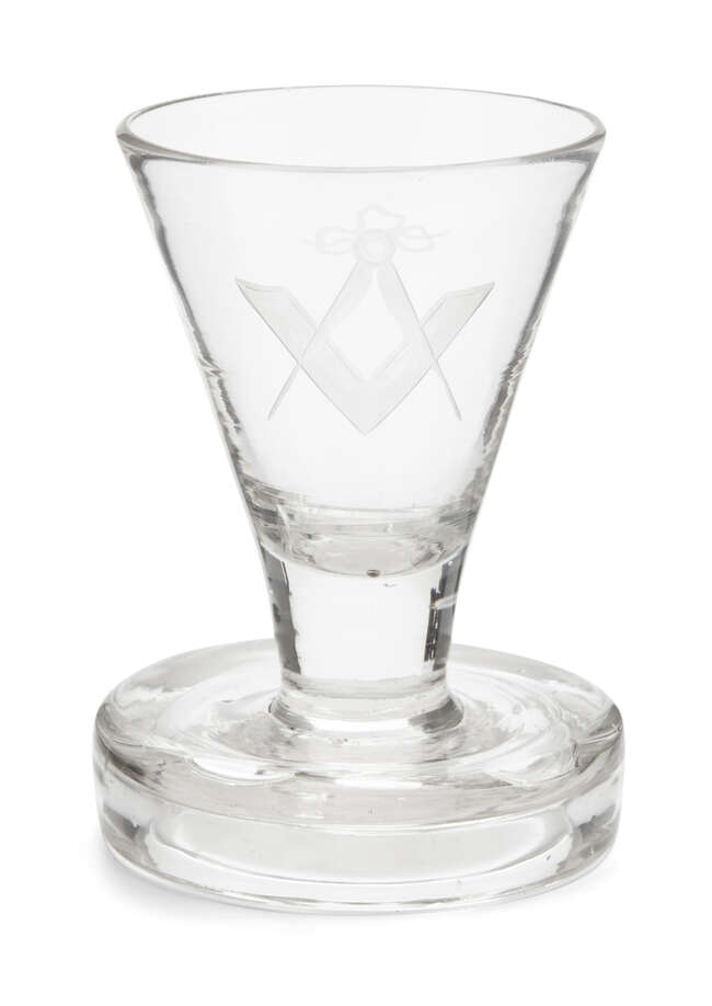 
	
		A Masonic firing glass, late 18th/early 19th century, with conical form bowl, engraved...