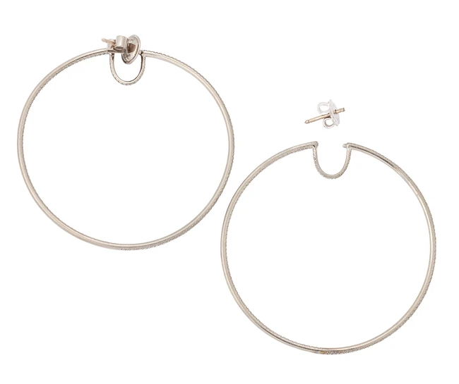 A pair of titanium diamond hoop earrings, of round form, grain set with brilliant-cut diamonds,...