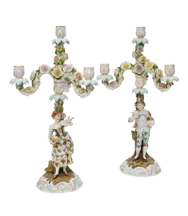 
	
		A pair of German porcelain floral-encrusted four light candelabra, probably Sitzendorf,...