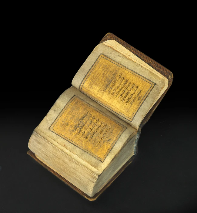 An extremely small miniature Qur’an, Qajar Iran, circa 1860, 
Unsigned and undated, 319ff.,...