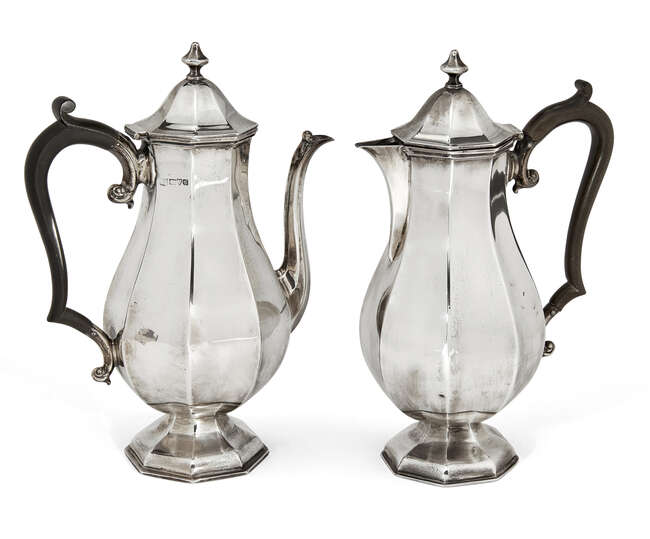
	
		An Edwardian silver coffee pot, Chester, c.1907, Barker Brothers, together with a matched...