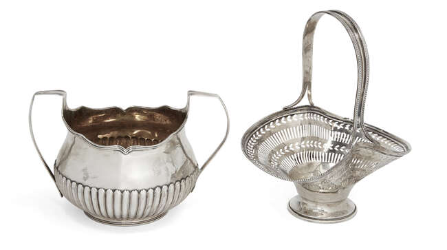 
	
		A George III twin handled sugar dish, London, c.1800, of half-lobed form (maker&#39;s mark...