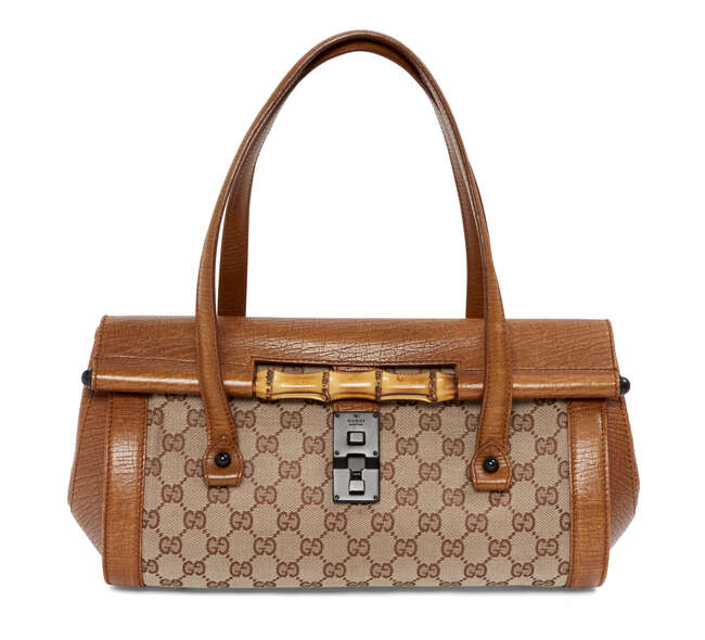 
	
		A Gucci Monogram Bamboo Bullet bag, the rectangular form body decorated with distinctive...