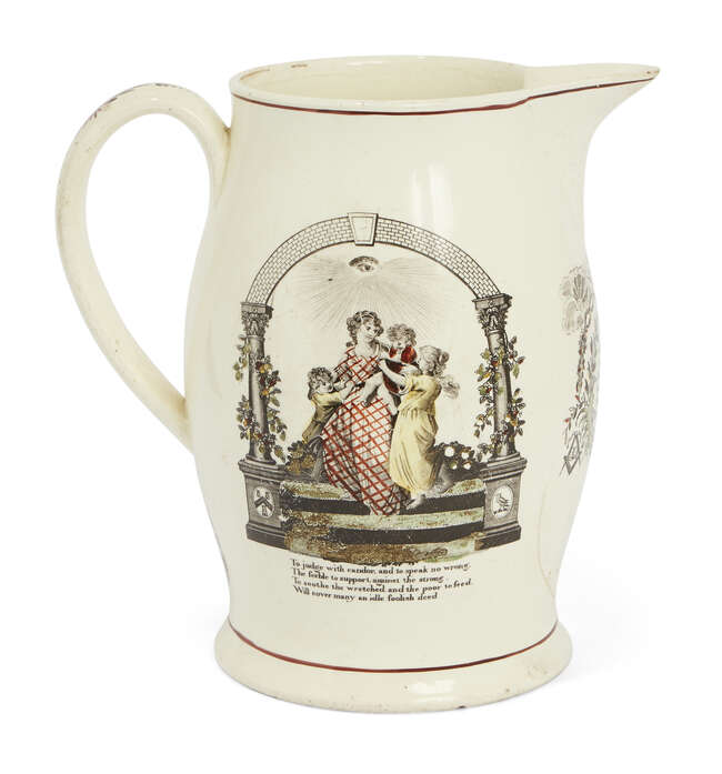 A large creamware Leeds Pottery Masonic jug, late 18th/early 19th century, designed with printed...