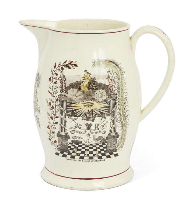 A large creamware Leeds Pottery Masonic jug, late 18th/early 19th century, designed with printed...