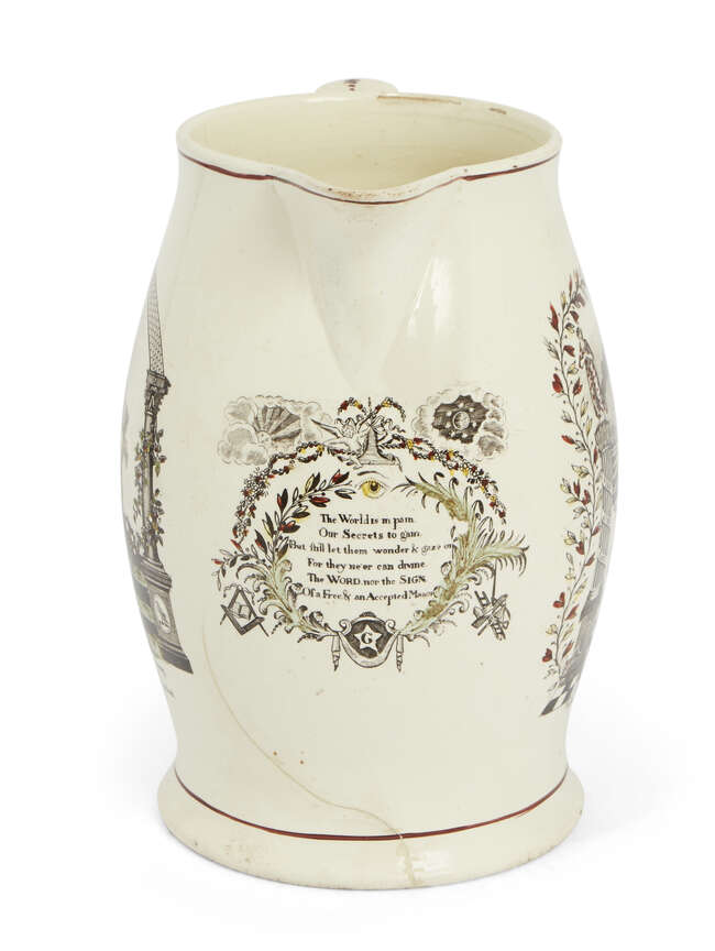 A large creamware Leeds Pottery Masonic jug, late 18th/early 19th century, designed with printed...