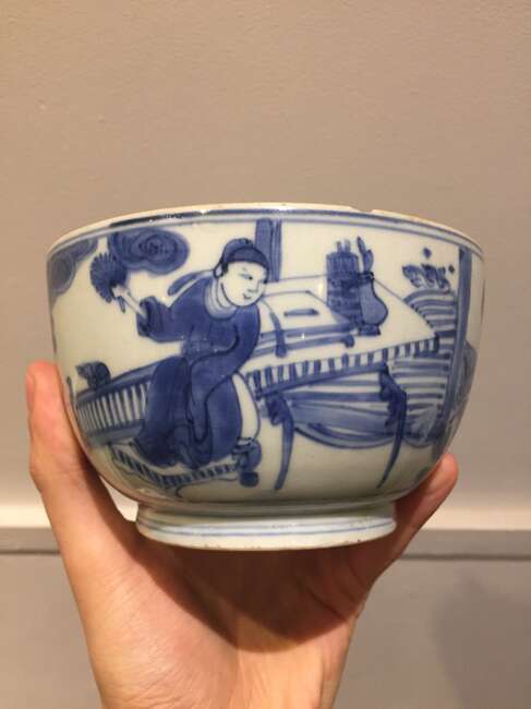 
	
		A Chinese porcelain bowl, Wanli period, painted in underglaze blue with a scholar seated...