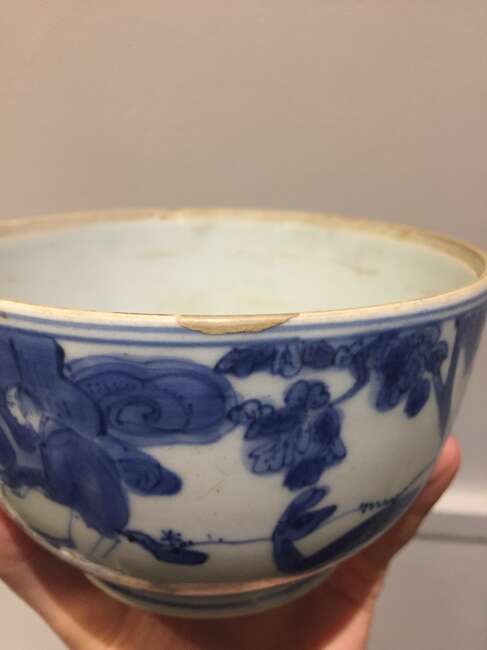 
	
		A Chinese porcelain bowl, Wanli period, painted in underglaze blue with a scholar seated...