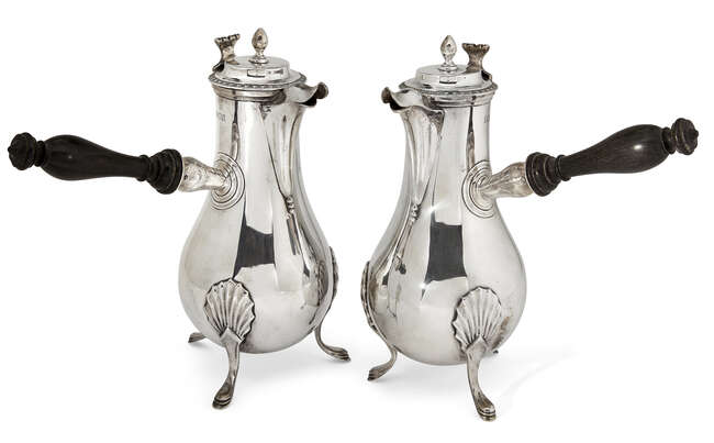 
	
		A pair of Victorian silver chocolate pots, London, c.1899, Daniel & John Wellby, the...