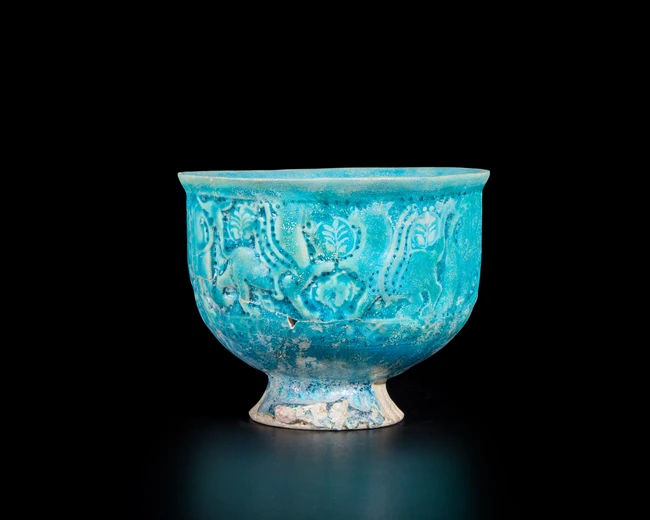 A conical turquoise blue glazed pottery bowl, Ilkhanid central Iran, 12th/13th century, 
On...