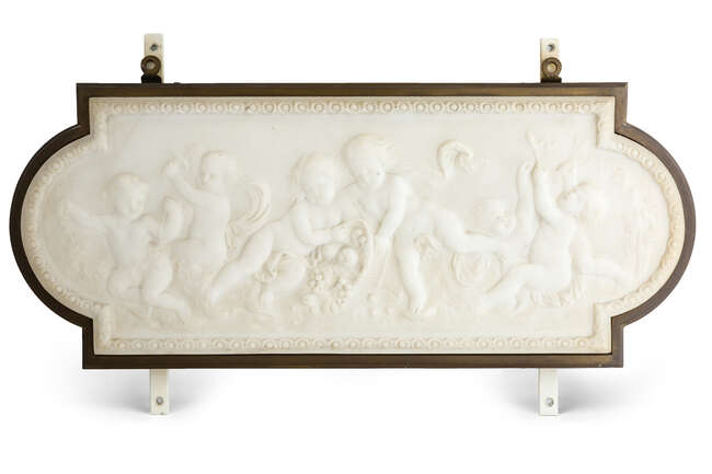 
	
		A marble relief plaque, c.1900, carved with playful putti with a basket of fruit and...