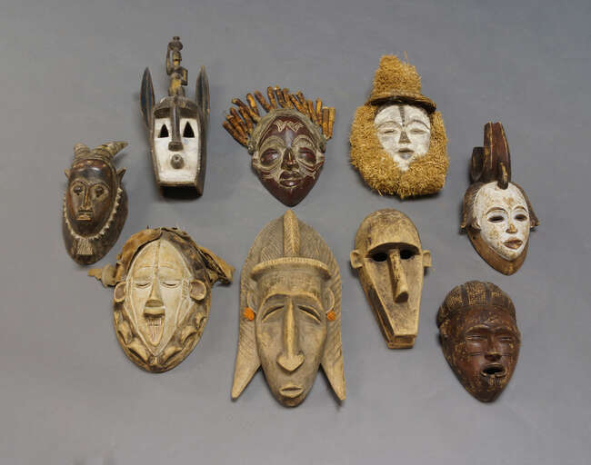 
	
		A tribal mask, in the Guro style, with two horns and a face with protruding round eyes,...