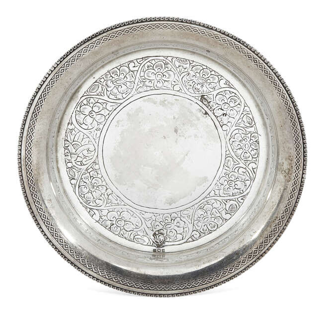
	
		An Egyptian silver goblet stand, c.1932, of circular form with beaded edge to flat base...