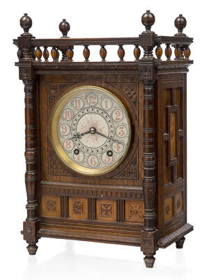 
	
		Elkington & Co, an oak cased mantle clock the design after or possibly by Lewis F Day,...