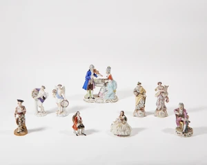 A group of Continental porcelain figures, last quarter 19th century - early 20th century, comprising: a pair of Volkstedt (Triebner, ENS & Eckert) allegorical 