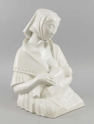 A Continental white glazed ceramic model of a young lady feeding her baby, early 20th century, incised to base, no. 3, 1934, 43cm high