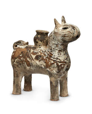 
	
		A Seljuk pottery rhyton in the form of a lion, Iran, 13th century, shown standing on four...