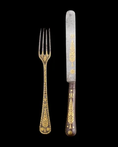 A damascened steel knife and fork,&nbsp;Ottoman Turkey, 19th century,&nbsp;
The knife's handle and rounded...