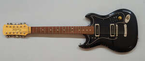 
	
		A Hagstrom 12 string guitar, serial no. 663665, with 22 frets, two single coil pickups,...