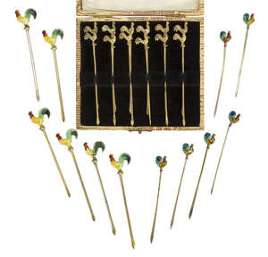 
	
		A set of twelve silver gilt 'cockerel' cocktail sticks
		c.1930, Stamped Sterling
		