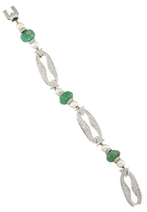 
	
		An emerald, diamond and cultured pearl bracelet, composed of a line of four fluted...