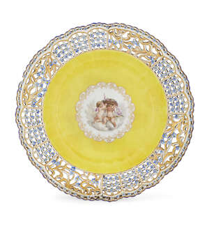 
	
		A Meissen porcelain cabinet plate, late 19th century, the rim with panels of reticulated...