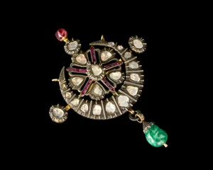 A diamond- and emerald-set Naya Chand Nyam pendant,India, circa 1900-1920
Made of five...