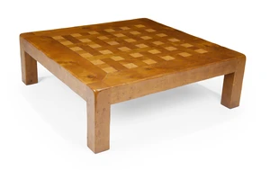 A large modern elm coffee table, by De Tonge, third quarter 20th century, with parquetry top, on block feet, 40cm high, 120cm wide, 120cm deep