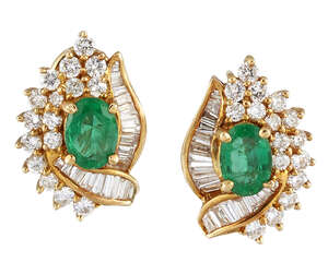 
	
		A pair of emerald and diamond cluster earrings, of stylised leaf design, the oval-cut...