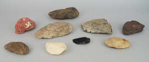 
	
		A collection of Neolithic stone tools, to include axe heads and scrapers, with a specimen...