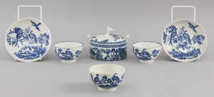 A Worcester blue and white butter tub and lid, circa 1775, printed with the  Fence pattern, lacking stand, together with three Worcester blue and white tea bow