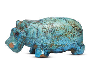 
	
		An Egyptian turquoise glazed composition hippopotamus, Second Intermediate Period, circa...