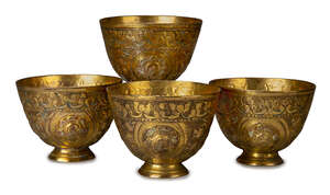 
	
		Four Ottoman Tombak gilded copper cups, Turkey, 19th century, each on a short foot, the...