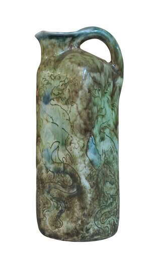 
	
		Martin Brothers, 
		 
		Square dragon jug, 1894, 
		Glazed stoneware, 
		Underside...