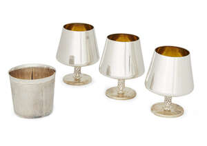 A cased set of three Irish silver goblets and a silver tumbler, by the Royal Irish Silver Co., for Garrard & Co., Dublin, c.1973, each goblet, with gilt interi