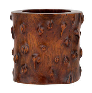 
	
		A Chinese huanghuali tree trunk-form brush pot, bitong, 18th century, the cylindrical pot...