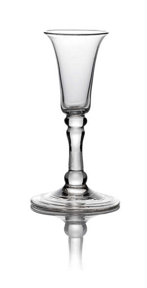 A George III drinking glass, with long fluted bowl, with knop to bowl base, on plain stem with basal knop to spreading fold over foot, 12cm high