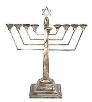 
	
		A silver menorah with Star of David finial, London, c.1971, A. Taite & Sons Ltd., the...