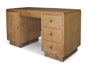 
	
		Manner of Jacques Adnet, 
		 
		Art Deco limed oak kneehole desk, circa 1930, 
		Limed...