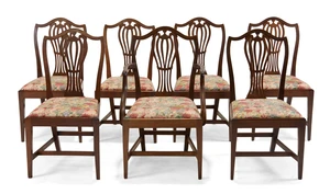 A set of seven English mahogany dining chairs, of George III style, second quarter 20th century,...