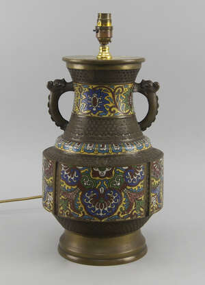 
	
		A Chinese champlevé enamel two handled vase, 20th century, overall decorated with panels...