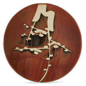 
	
		A Japanese Mashiko stoneware charger, 20th century, solid and rustic form, rich red glaze...