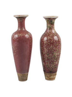 
	
		Two Chinese porcelain peachbloom-glazed amphoras, liuye zun, Kangxi marks, late 19th...