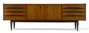 
	
		Danish, a teak sideboard in the manner of Arne Vodder    
		c.1960  
		With two...