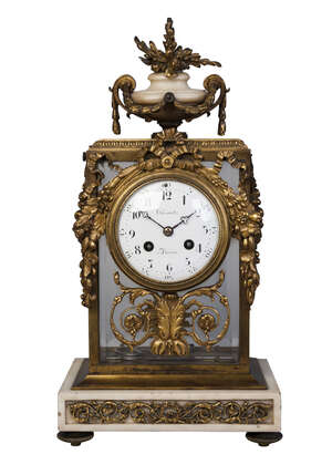 
	
		A French white marble and gilt bronze mantel clock by Chiout, 19th century, with an urn...