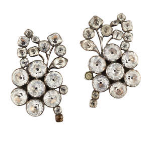 
	
		A pair of Georgian silver, foiled paste earclips, of floral spray design set throughout...