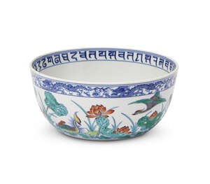 A fine Chinese porcelain doucai bowl, Jiaqing mark and of the period, delicately detailed with a...